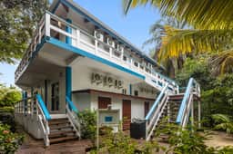 Tranquil ocean-view escape with shared pool, beach access, AC, & free wifi