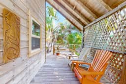 Romantic beachfront home with ocean views, dock, free WiFi, and outdoor dining
