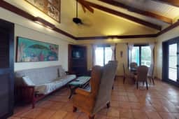 Beachfront, ocean-view getaway with shared pool, hammock, WiFi, & central AC