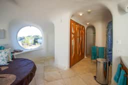 Lagoon-front studio with water access, infinity pool, & AC