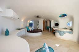 Lagoon-front studio with water access, infinity pool, & AC