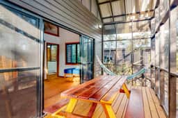 Three forest cabanas with verandas, hammocks, WiFi & partial AC - walk to beach
