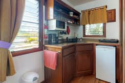 Cabana with WiFi and a shared pool, patio area, and grill - walk to the beach