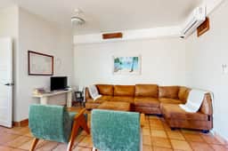 Charming beachfront condo with a kitchenette, shared pool, WiFi, & beach access