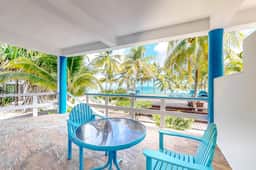 Charming, beachfront condo with shared outdoor pool, central AC, & free WiFi