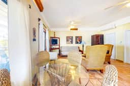 Charming, beachfront condo with shared outdoor pool, central AC, & free WiFi
