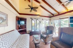 Ocean view condo at beachfront complex with AC, free WiFi, & pool
