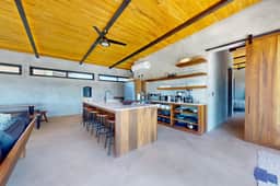 Elegant waterfront villa with private terrace, pool, beach access & 4 en-suites