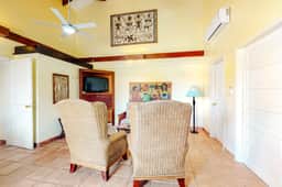 Comfortable oceanfront condo with a shared pool, ocean views & free WiFi