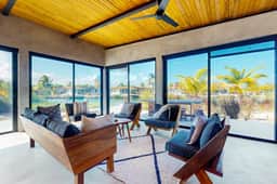 Elegant waterfront villa with private pool, terrace and beach club access