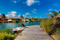 Elegant waterfront villa with private pool, terrace and beach club access