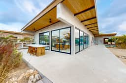 Waterfront villa with pool, spacious deck, dog-friendly & office space