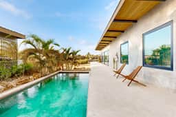 Waterfront villa with pool, spacious deck, dog-friendly & office space