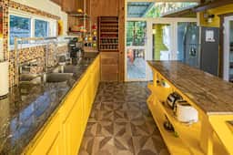 Tropical oasis with pool, large deck, modern amenities & perfect for unwinding
