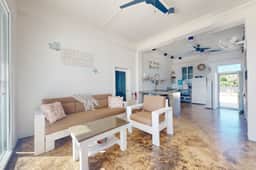 Luxurious beachfront home with private pool, rooftop grill, and sea views