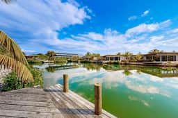 Spacious waterfront villa with splash pool, beach access & private terrace
