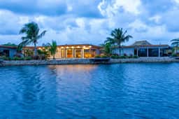 Waterfront villa with splash pool, private terrace, beach access & WiFi