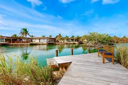 Relaxing lagoonfront villa with private pool, dock, cafe & on-site spa