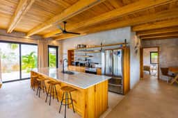 Relaxing tropical villa with private plunge pool, open layout & canal water view
