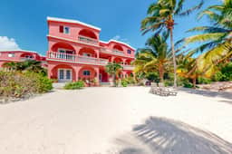 Romantic beachfront getaway with ocean views, pool, WiFi & partial AC