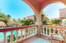 Ocean-view condo with pool, immediate beach access & partial AC