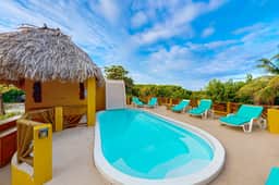Waterfront villa with private pool, balcony, partial AC, fast WiFi - near beach