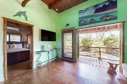 Waterfront villa with private pool, balcony, partial AC, fast WiFi - near beach