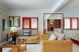 Beachfront condo w Caribbean Sea view, shared pool & dock, partial AC & WiFi