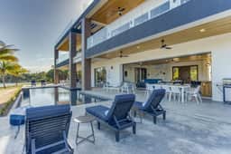 Spacious villa retreat with private pool, rooftop deck, kayaks, and pet-friendly perks