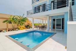 Luxe oceanfront escape with pool, lanais, penthouse suite & ground-floor access
