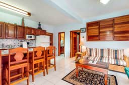 Ocean-view apartment in a beachfront resort with shared pool, WiFi & partial AC