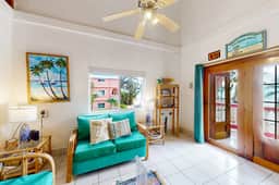 Breezy oceanfront, 2-story condo w shared pool, beach access, WiFi & partial AC