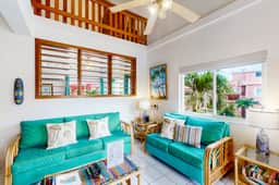 Breezy oceanfront, 2-story condo w shared pool, beach access, WiFi & partial AC