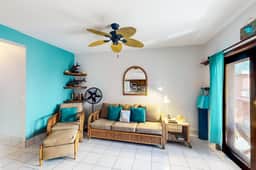 Ocean-view condo with outdoor pool, dock, grill, balcony, beach access