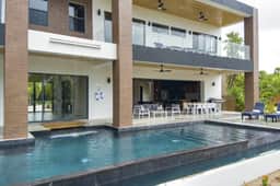 Serene villa with infinity pool, waterfall & modern amenities