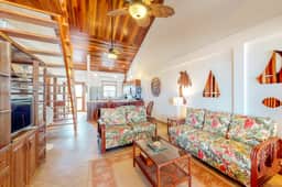 Family-friendly beachfront condo w shared pool & dock, sea view, WiFi & partial AC