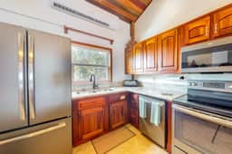 Family-friendly beachfront condo w shared pool & dock, sea view, WiFi & partial AC