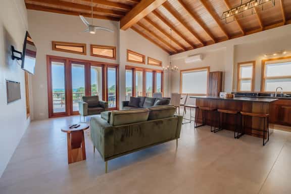 Spacious beachfront retreat with a soaking tub - pool, canoes, dock, & grill - Image 1