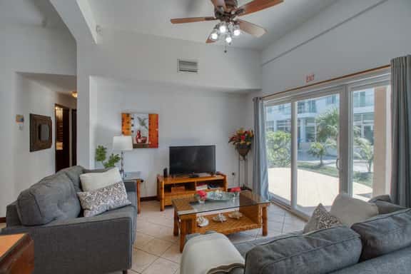 Ground-level condo w WiFi, central AC, & pool - walk to the beach - Image 1