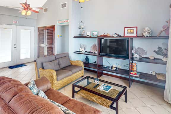 Waterfront condo with pool & high-speed WiFi - walk to the nearby beach - Image 1