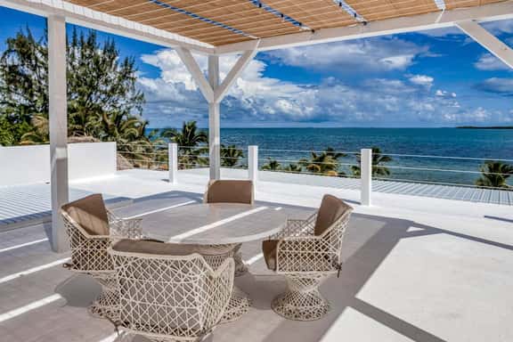 Luxurious beachfront home with private pool, rooftop grill, and sea views - Image 1