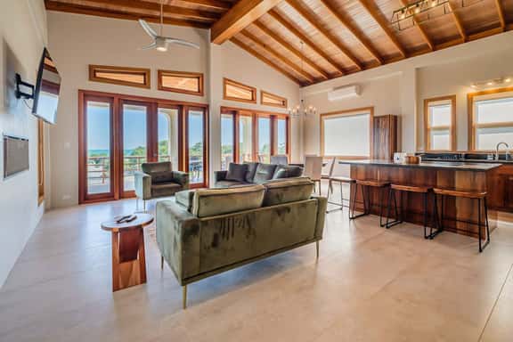 Tropical retreat villa with a pool, dock, bikes, canoes, balconies, and 360 views - Image 1