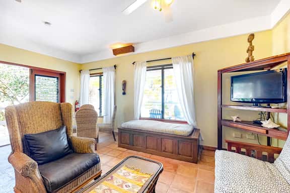 Charming, beachfront condo with shared outdoor pool, central AC, & free WiFi - Image 1