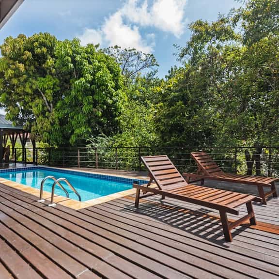 Tropical beachfront getaway with private pool, ocean views & enclosed yard - Image 1