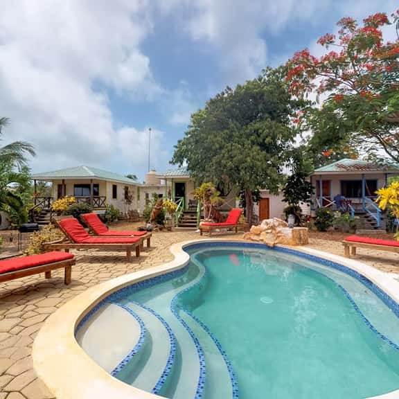 Wood cabana with a porch, pool view, WiFi, and a shared common area with grills - Image 1