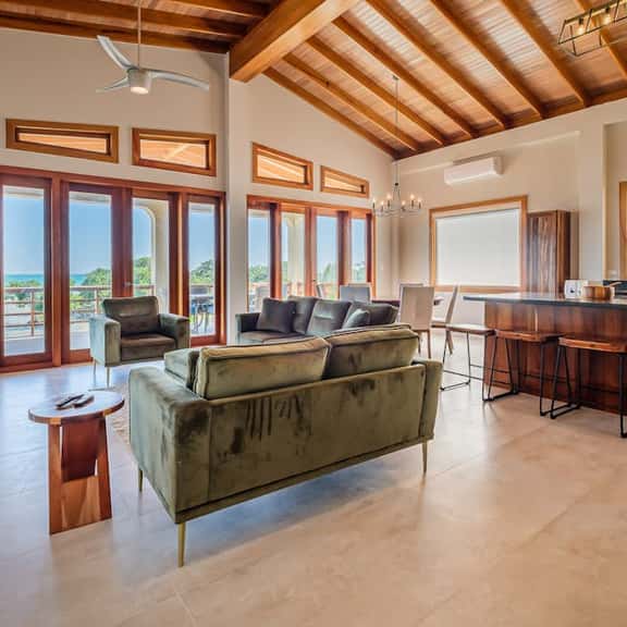 Tropical retreat villa with a pool, dock, bikes, canoes, balconies, and 360 views - Image 1