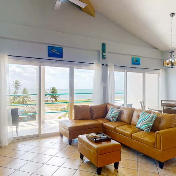 Steps from the sea apartment with shared pool & ocean-view balcony - Image 1