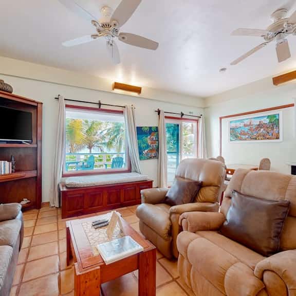 Colorful oceanfront condo with shared pool, WiFi, ocean view, and central AC - Image 1