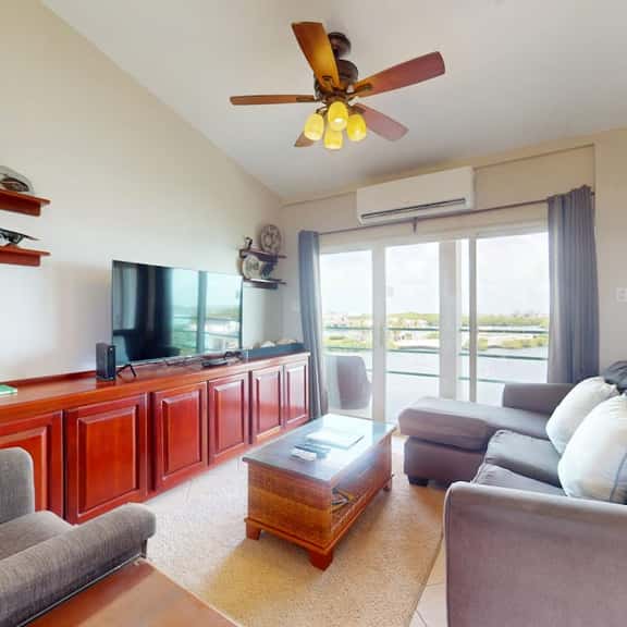 Sunny waterfront villa with outdoor pool, balcony, & AC - Image 1