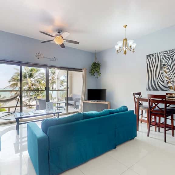 Beachfront condo with balcony, sea view, partial AC, pool, dock & kayaks - Image 1